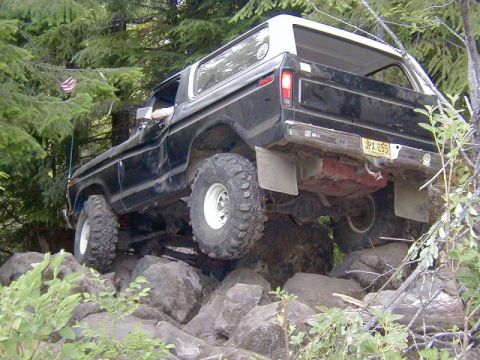 1978 Ford Bronco - This 1978 Ford Bronco is navigating a difficult rocky terrain on an off-road trail.