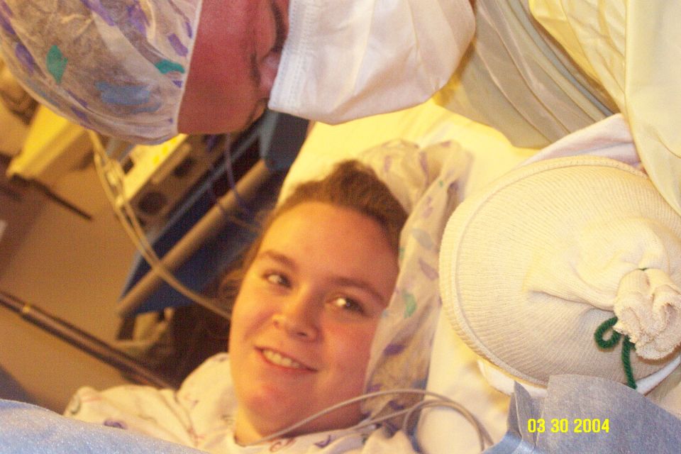 Woman in hospital bed with medical equipment