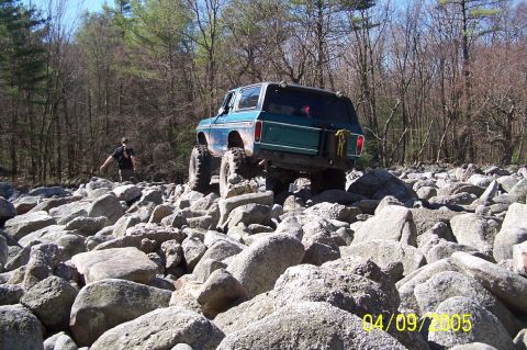 1979 Ford Bronco - Ford Bronco tackling a challenging rocky off-road course.