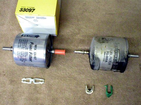 2003 Ford Escape - Here’s a comparison of the old and new filters and hardware. I chose a WIX #33097 to install. Note, the WIX filter has two of the same type…