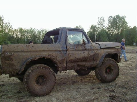 1978 Ford Bronco - This heavily mud-caked 1978 Ford Bronco is seen in profile, likely after participating in a mud drag event.