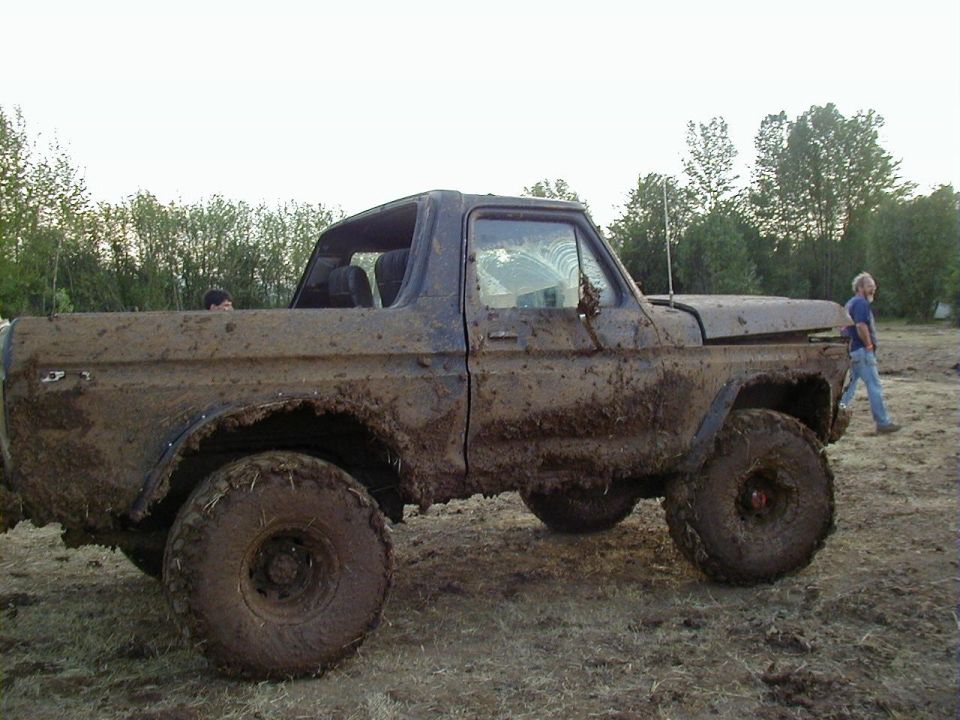 Mud-covered 1978 Ford Bronco side view