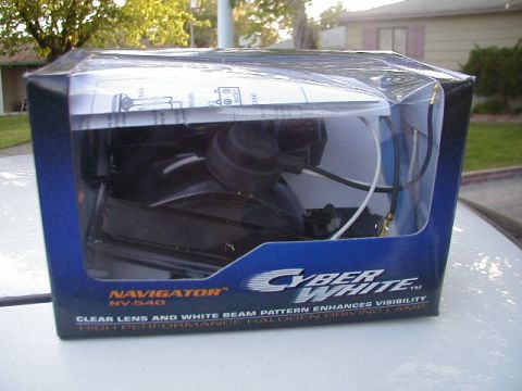 1993 Ford Probe - Boxed Navigator NV-540 Cyber White halogen driving lamps are shown.