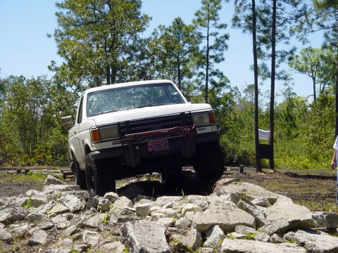 1989 Ford Bronco - This 1989 Ford Bronco is shown tackling a challenging rocky terrain during an off-road event.