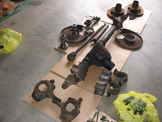 Speaking of front, here are many of the components that can be had "used".  D44 78-79 housing, everything knuckle out is Chevy 3/4T, including the chevy big bearing spindles, and flat top knuckles.