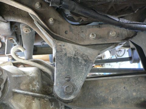 1991 Ford Explorer - Undercarriage view showing suspension brackets and drivetrain components.