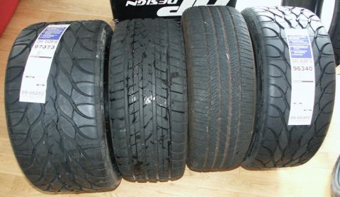 2001 Mercury Grand Marquis - Four tires displayed, two showing BFGoodrich branding and size information.