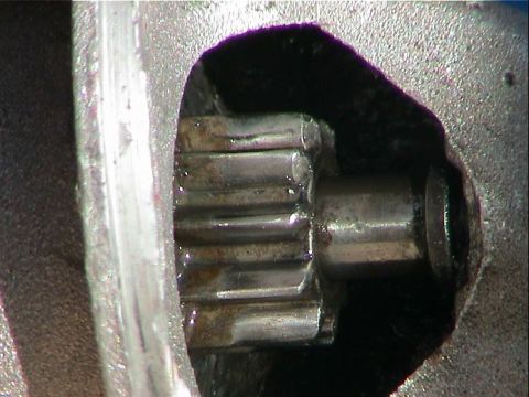 1979 Ford Bronco - Detail of a mechanical gear, likely from an engine or transmission component.