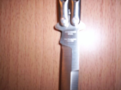 1971 Chevrolet Chevelle - A close-up view of a knife with markings indicating it was made in the USA.