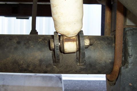 1994 Ford F-150 - Rear axle shock mount detail, showing the connection point for the shock absorber.