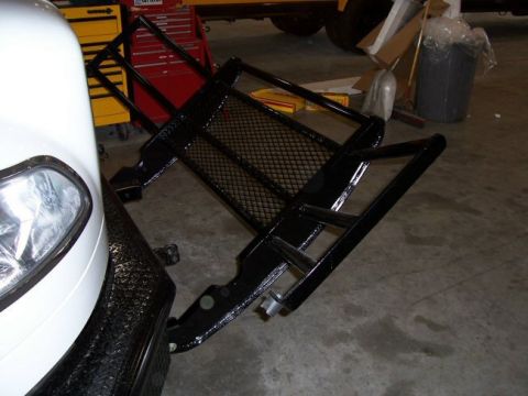 1978 Ford F-250 - A black metal grille guard is attached to the front of a white vehicle.