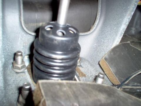 1988 Ford Bronco - Close-up view of the gear shifter boot and lever inside a 1988 Ford Bronco.