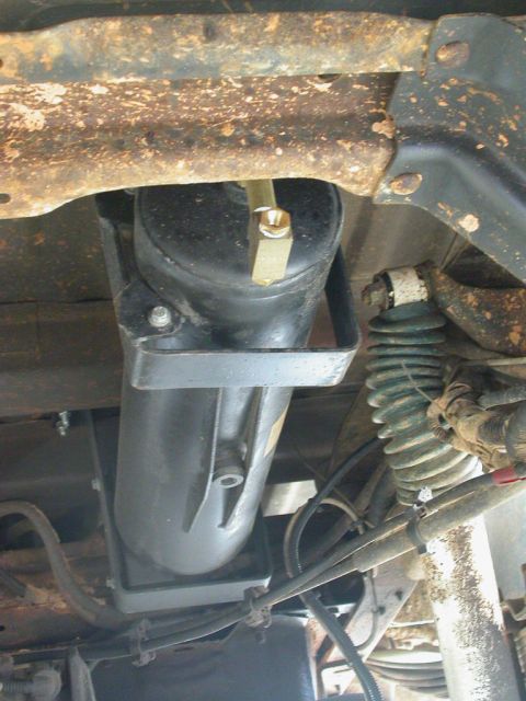 1990 Ford Bronco - My air tank, actually Land Rover surplus. Note the bad ass skids around the drain bung. Very cool. Thanks to Steve83 for scavenging it for…