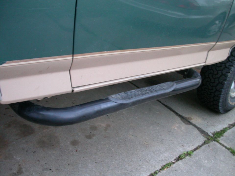 Westin nerf bars.  I've been thinking hard about replacing these with sliders.