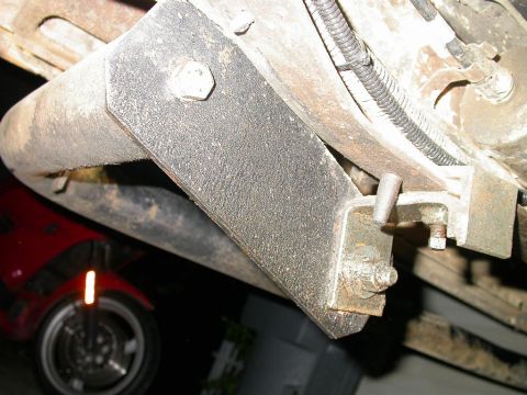 1990 Ford Bronco - Rear nerf bar mount, drivers side.