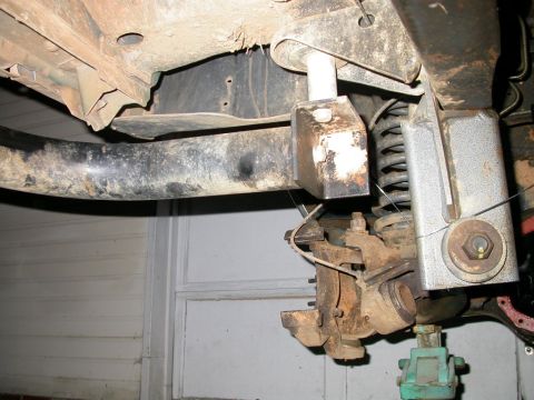 1990 Ford Bronco - Front Nerf bar mount, mounts on body mount bolt
