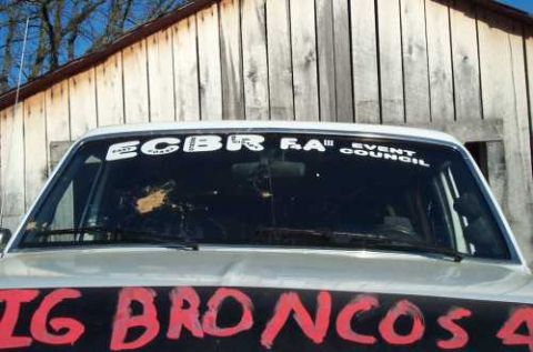 1988 Ford Bronco - The vehicle has a large red painted "BIG BRONCO" graphic across the hood.