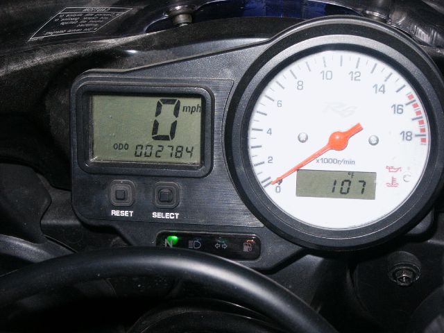 Motorcycle gauge cluster with digital speedo, R6 tachometer, and warning lights