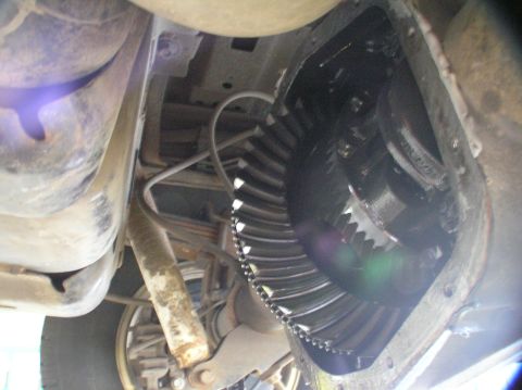 2000 Ford Excursion - Close-up view of the internal gears of a rear differential with the cover removed.