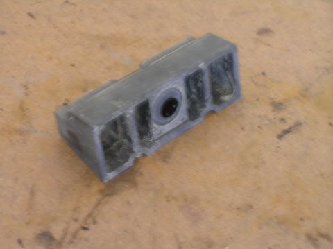 2000 Ford Excursion - This is the battery holder that the bolt goes through when mounted in the tray.