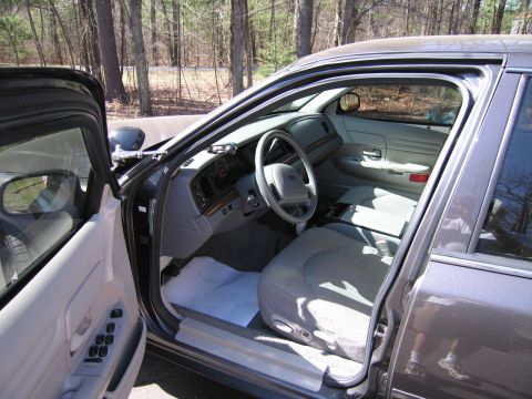 1991 Ford LTD Crown Victoria - Interior view of a 1991 Ford Crown Victoria, highlighting the dashboard and seating area.
