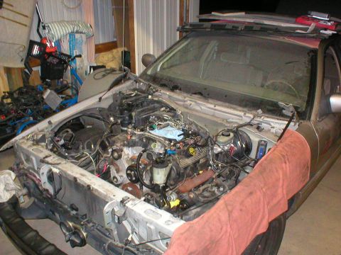 1994 Ford Crown Victoria - It's FINALLY back in. I still have to replace 2 connectors that the junkyard destroyed & figure out a bracket for the engine cover, but it'…