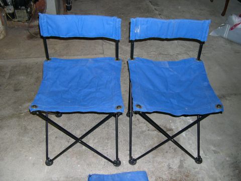 1994 Ford Bronco - A pair of blue canvas folding chairs are shown in a garage setting.