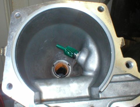 1994 Ford Crown Victoria - The tip of the driveshaft slip yoke is reduced, so it appears loose in the bushing. The green plastic gear is the 17-tooth DRIVEN gear of t…