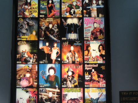 1968 Ford Mustang - A display of magazine covers with blank faces allows visitors to insert their own photo into the cover.