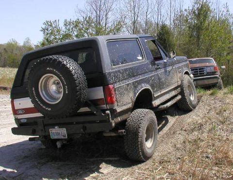 1988 Ford Bronco - Ironclad flexing four inches and thirty-fives.