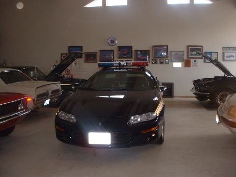 1999 Ford Crown Victoria - 1998 B4C Camaro. Restored back as a Nevada Highway Patrol car.