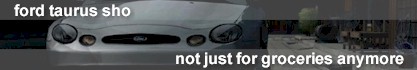 2001 Ford Taurus - Front view of a 2001 Ford Taurus SHO, showing the grille and headlights.