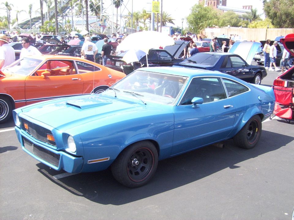 Blue 1975 Ford Mustang II coupe with hood scoop
