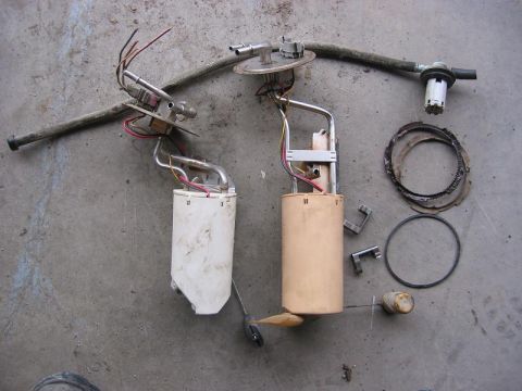 1985 Ford Bronco - F250 pump(White) next to a Bronco pump(tan).