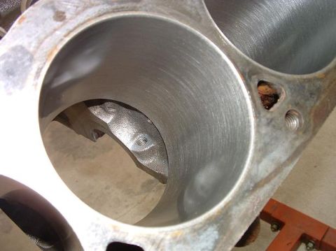 1985 Ford LTD Crown Victoria - The machined cylinder walls of an engine block are visible in this close-up shot.