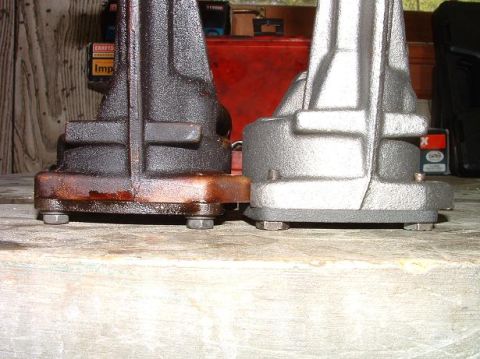 1985 Ford LTD Crown Victoria - Comparison of a used, oil-covered engine component next to a freshly cleaned one.