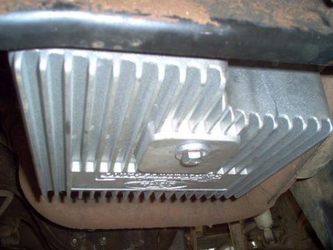 1988 Ford Bronco - This aftermarket oil pan features a finned design for improved cooling.