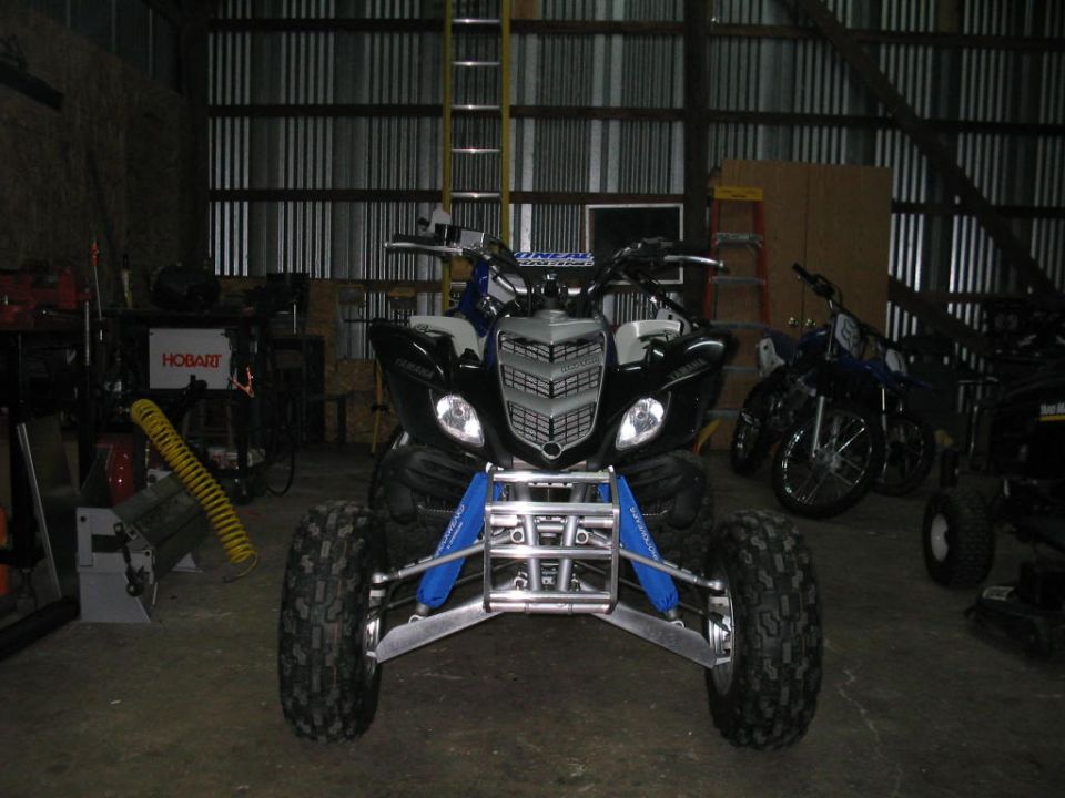 Handmade custom front bumper and a-arm skid plates on the Raptor