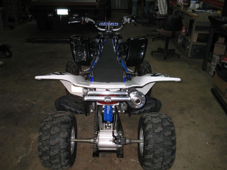 Handmade rear grab bar and 1 1/4" exhaust insert on Raptor