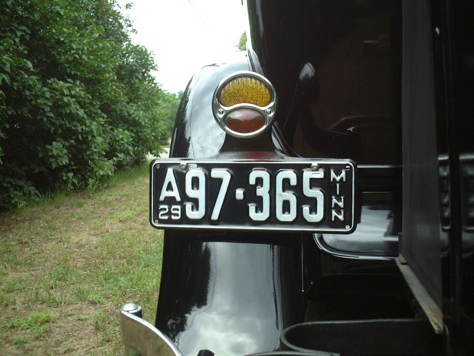 Rear view of a 1929 Ford Model A with license plate A97-365