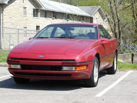 1991 Ford Probe - Front 3/4 view of a red 1991 Ford Probe.