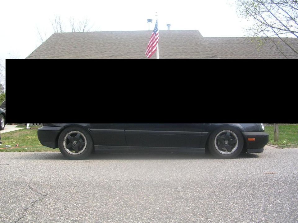 1996 Volkswagen GTI side profile, lowered suspension, black paint