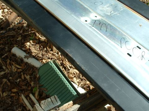 1985 Ford Bronco - Metal trim with handwritten text 'I'M PC R' is visible in this close-up shot.