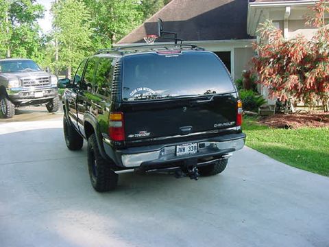 2000 Chevrolet Tahoe - Rear view of a black 2000 Chevrolet Tahoe SUV parked in a driveway.