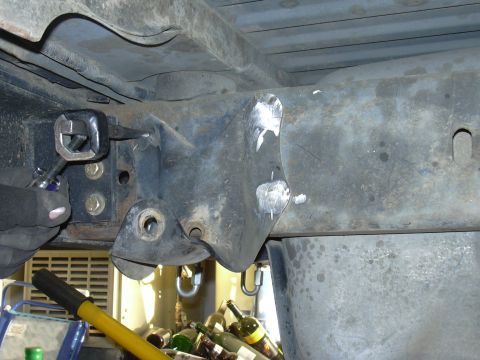 1991 Ford Bronco - Punchin the rivits out of the stock shackle hanger