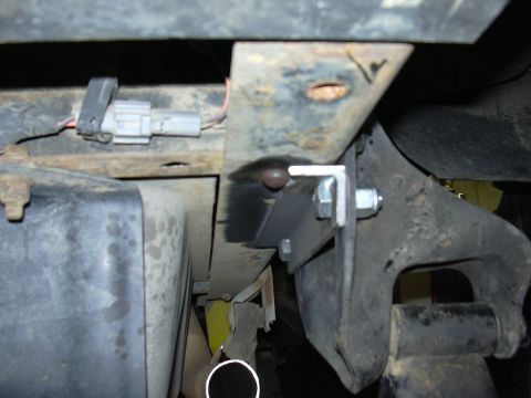 1991 Ford Bronco - Added this piece of angle iron behind the shackle hanger to give extra support and make it possible to put bolts in the remaining holes of…