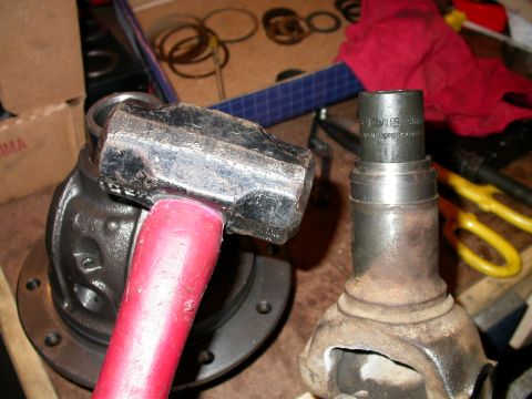 1990 Ford Bronco - Put the shaft in the vise, drop the spring in the hole, put the socket on top of it and mechanically agitate the socket with the BFH. Don't…