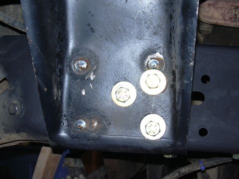 1991 Ford Bronco - The engine cross member was in the way on the drivers side so I put 3 bolts where I could and button welded the rest of the empty holes to…