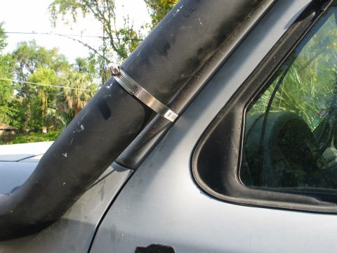 1992 Ford Bronco - hose clamps through door pillar via dremel cutting wheel