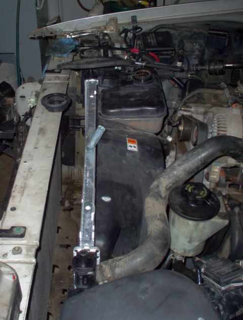 1994 Ford Crown Victoria - I have to use this radiator to mount the fan, which the EEC controls, but it's slightly too large for the older core support, and there's n…